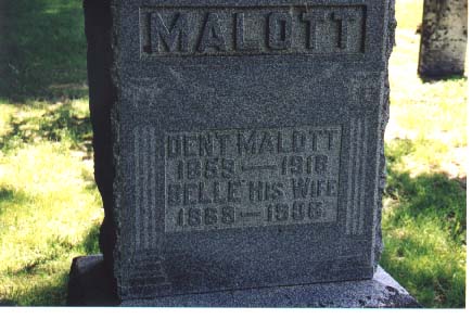 Headstone reading Malott, Dent Malott 1859-1918, Belle his wife 1868-1906