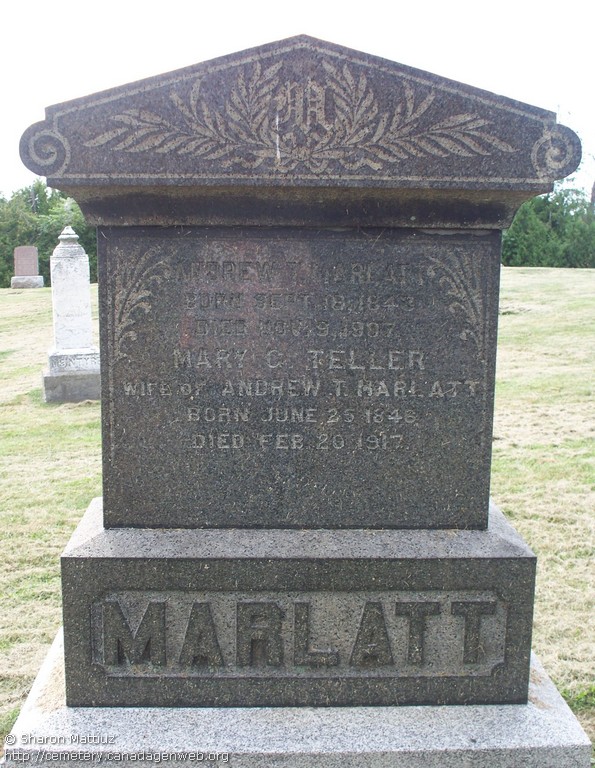 Dark granite monument reading Andrew T. Marlatt born Sept 19 1843 died Nov 9 1907, Mary G. Teller wife of Andrew T. Marlatt born June 25 1846 died Feb 20 1917