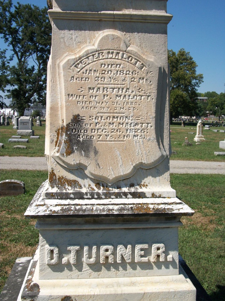 Tall white marble monument panel reading Peter Malott died Jan 20 1826, Martha wife of P. Malott died May 31 1883, Solomon son of P. and M. Malott died Dec 26 1825