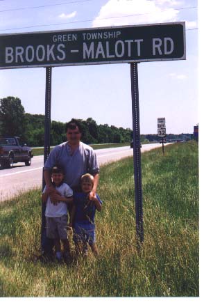 Road sign reading Green Township, Brooks-Malott Road